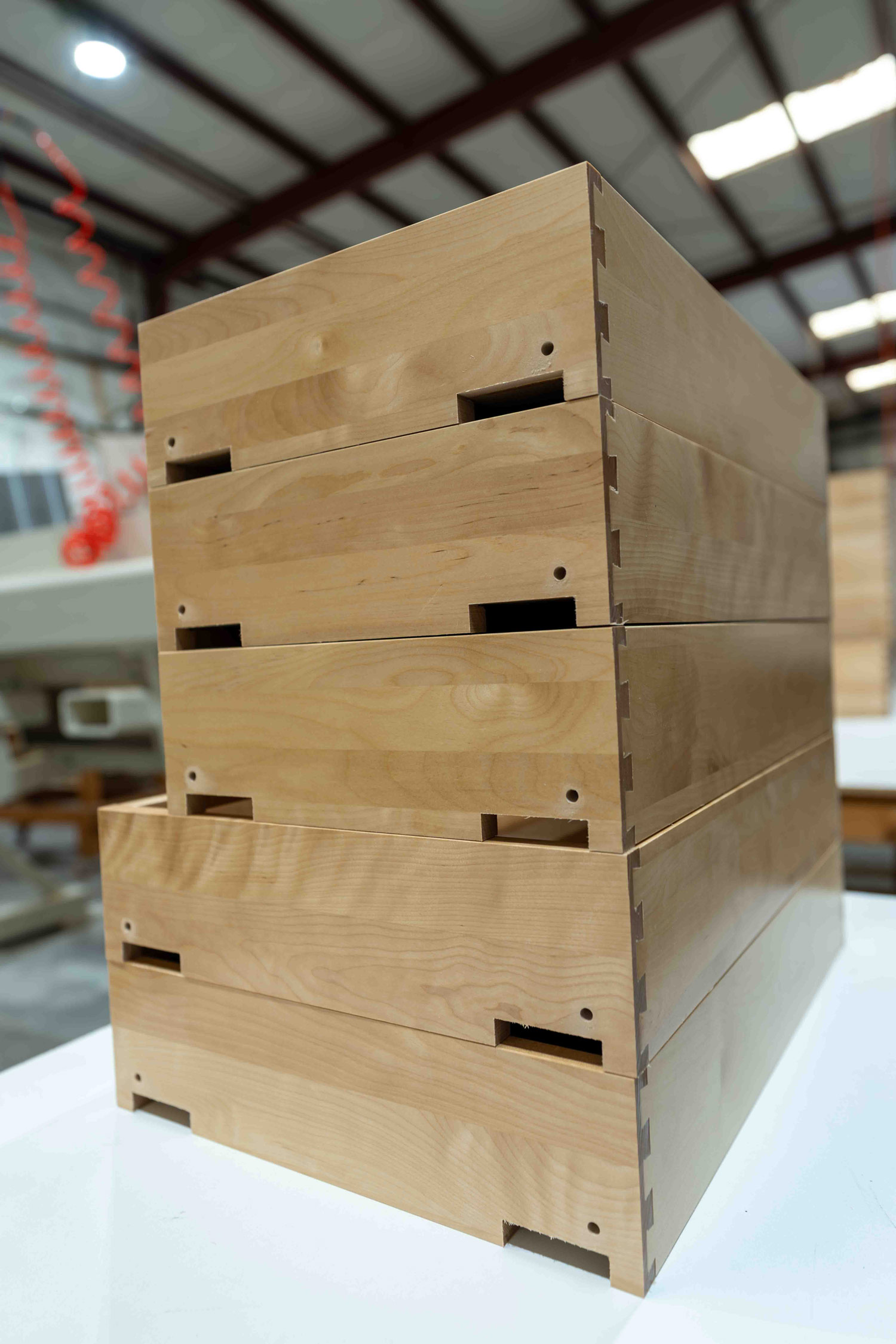 This image shows dovetailed drawers stacked on top of each other. 