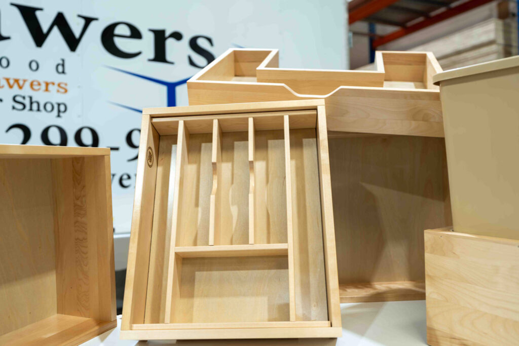 This image shows a custom made drawer made for storing cutlery. 